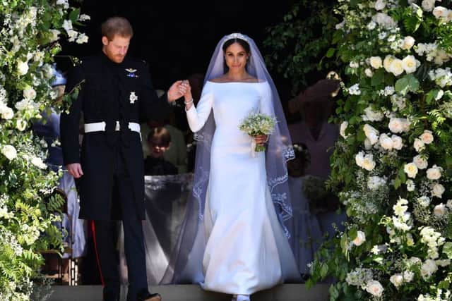 Prince Harry and Meghan Markle leaving at St. George's Chapel in Windsor Castle after their wedding ceremony. Picture: PA Wire