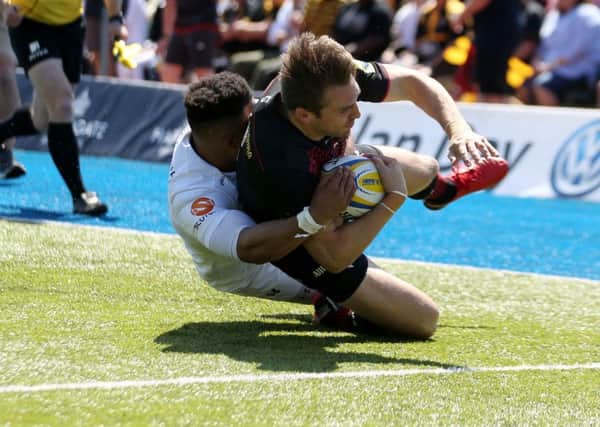 Saracens' Chris Wyles slides in to score their third try during the Aviva Premiership semi-final. Picture: PA.