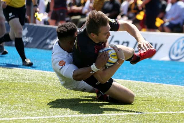 Saracens' Chris Wyles slides in to score their third try during the Aviva Premiership semi-final. Picture: PA.