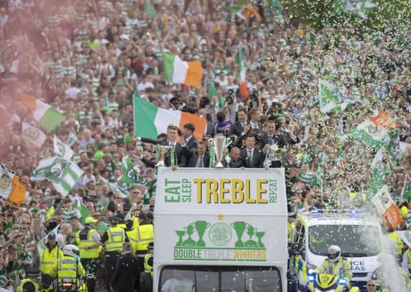 The Celtic open top bus on its way to Parkhead. Picture: SNS/Ross Parker