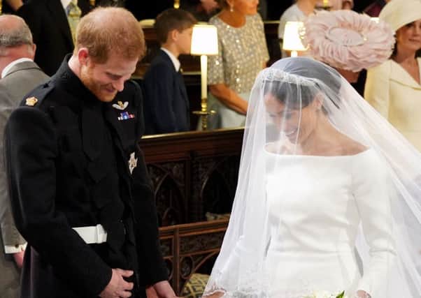 Prince Harry and Meghan Markle during their wedding ceremony. Picture: PA Wire