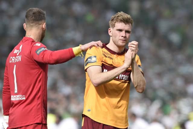 Chris Cadden looks dejected at full time. Picture: SNS