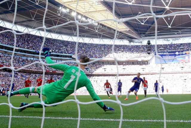 Chelsea's Eden Hazard scores from the sport. Picture: Nick Potts/PA Wire
