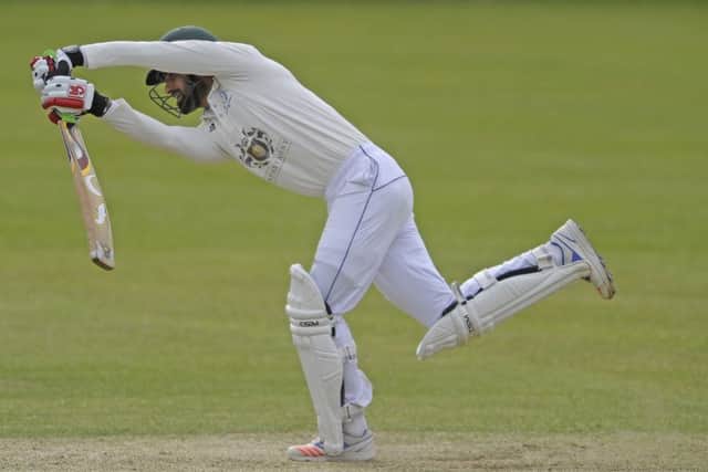Hammad Azam of Royal High on his way to making 63 against Watsonians. Picture: Neil Hanna.