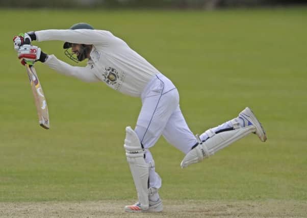 Hammad Azam of Royal High on his way to making 63 against Watsonians. Picture: Neil Hanna.