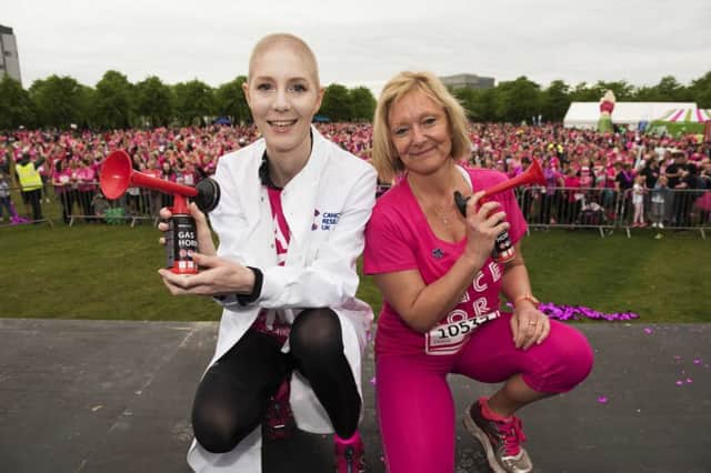 Cancer scientist Dr Zuzana Brabcova, left, who had radiotherapy and chemotherapy for cervical cancer diagnosed in 2016, and nurse Gaynor Williams-Hamilton, who survived breast cancer, were the VIP starters for the Race for Life at Glasgow Green yesterday. More than 7,000 women took part in the Cancer Research UK event. Picture: contributed