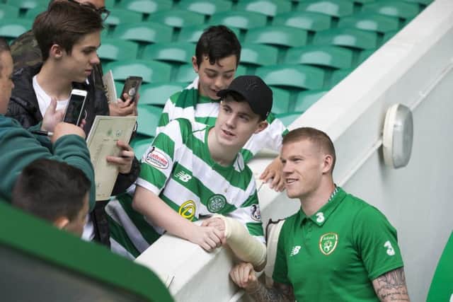 James McClean poses for pictures with fans during Scott Brown's testimonial match at Celtic Park. Picture: PA