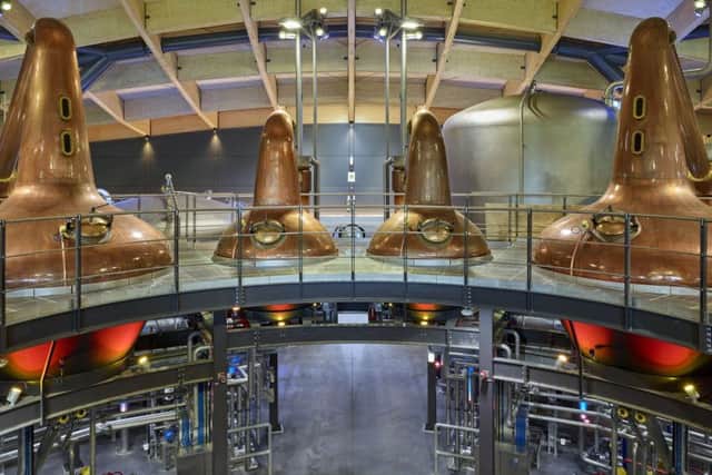 24 of Macallan's exceptionally small spirit stills sit side by side with the 12 wash stills, each seperated into independent production cells. Picture: Mark Power and Ian Gavan