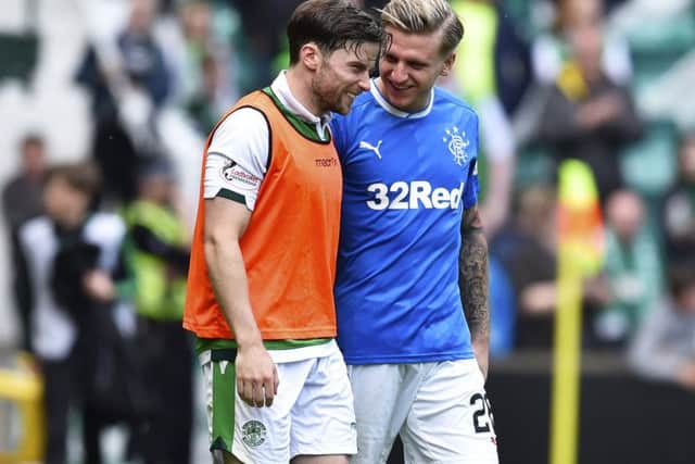 Rangers' Jason Cummings, right, and Hibs' Lewis Stevenson both helped their clubs qualify for Europe. Picture: Rob Casey/SNS