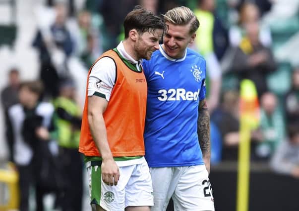 Rangers' Jason Cummings, right, and Hibs' Lewis Stevenson both helped their clubs qualify for Europe. Picture: Rob Casey/SNS