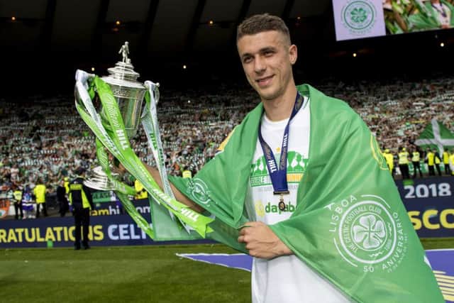 Jozo Simunovic celebrates with the William Hill Scottish Cup after the 2-0 final defeat ofMotherwell. Picture Craig Williamson/SNS
