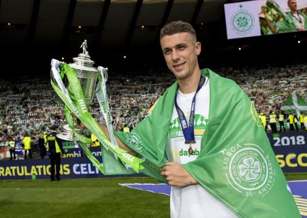 Jozo Simunovic celebrates with the William Hill Scottish Cup after the 2-0 final defeat ofMotherwell. Picture Craig Williamson/SNS