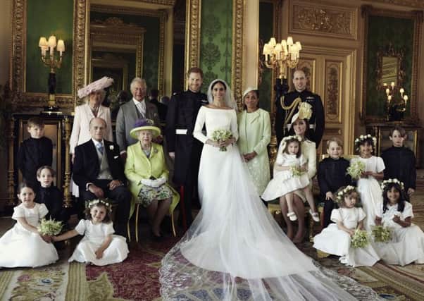 Wedding pictures show the newly-weds surrounded by the royal family. Picture: Alexi Lubomirski/Kensington Palace via AP