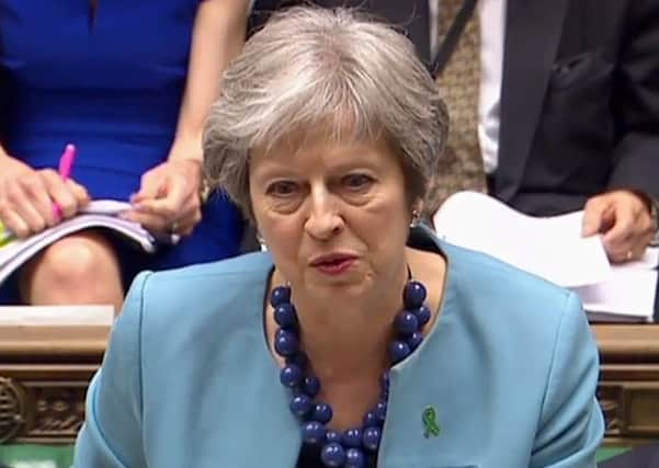 Britain's Prime Minister Theresa May as she speaks during Prime Minister's Questions (PMQs). Picture: Parliament TV