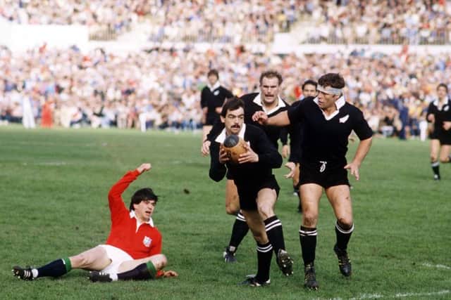 Roger Baird, grounded, in action for the Lions against New Zealand's David Loveridge, Andy Haden and Andy Dalton in the fourth Test in Auckland in 1983. Picture: Colorsport/REX/Shutterstock