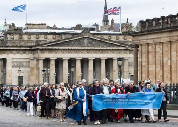 Female Church of Scotland ministers and supporters march to celebrate 50th anniversary of decision to ordain women ministers. PICTURE: ANDREW O'BRIEN