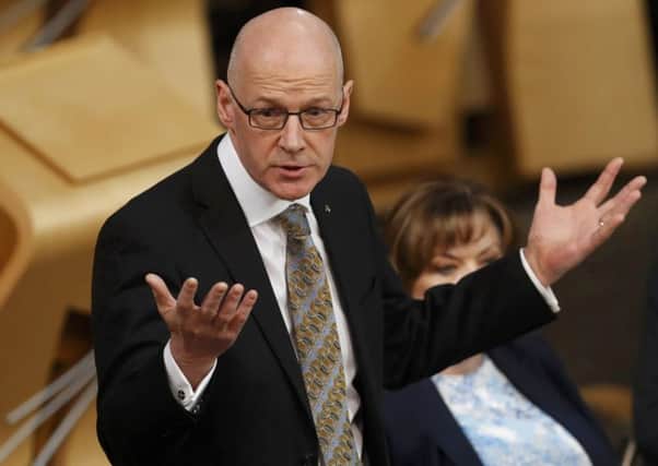 Deputy First Minister John Swinney said he was open to rethinking the tests for primary one pupils (Picture: PA)
