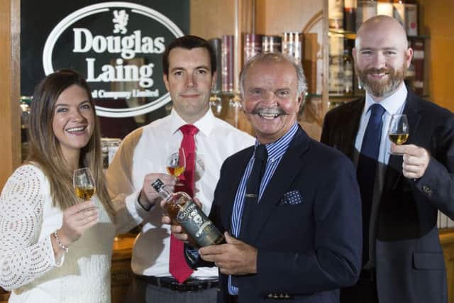 Members of the Douglas Laing board celebrate the latest results. Picture: Contributed