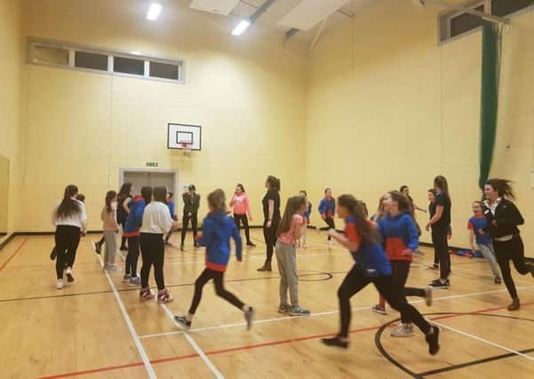 The 303rd City of Glasgow Guides enjoy some games.