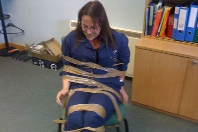 Fisheries officer DeeAnn Fitzpatrick was restrained by colleagues. Picture: BBC