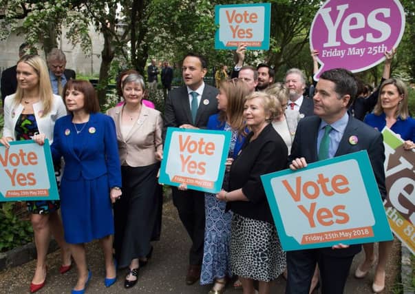 Ireland's Prime Minister Leo Varadkar (centre) poses with activists from the Yes campaign in the referendum on abolishing the country's ban on abortion. (PictureL AFP/Getty)