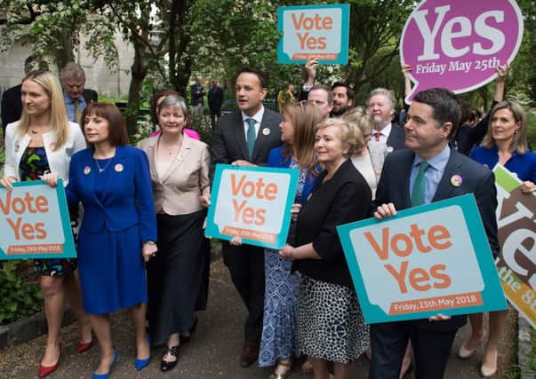 Ireland's Prime Minister Leo Varadkar (centre) poses with activists from the Yes campaign in the referendum on abolishing the country's ban on abortion. (PictureL AFP/Getty)