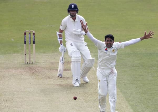 Pakistan's Mohammad Abbas celebrates taking the wicket of England's Stuart Broad. Picture: Adrian Dennis/AFP/Getty Images
