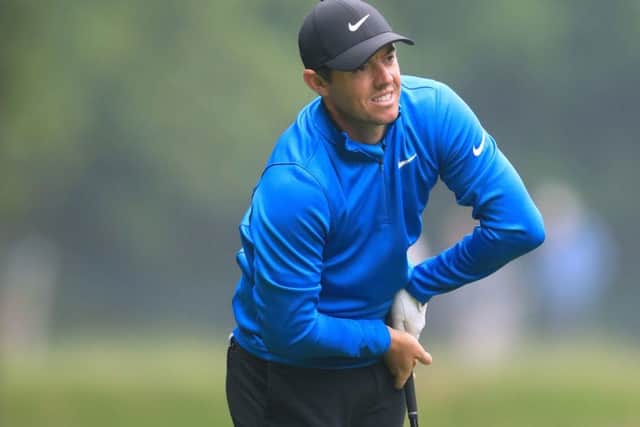 Rory McIlroy reacts after a shot on the 17th at Wentworth Golf Club during his best ever opening round in the BMW PGA Championship. Picture: Adam Davy/PA