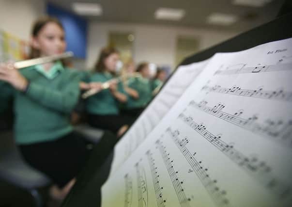 Parents in West Lothian are keen to keep their kids' music lessons, even it means paying for them. Picture: Christopher Furlong/Getty Images)