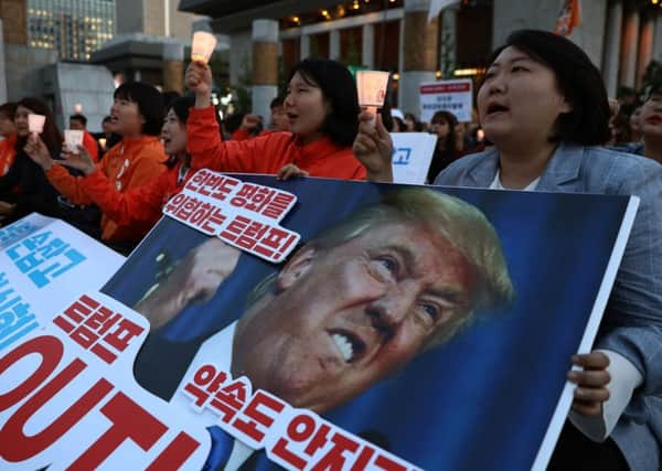 Activists gather in front of the U.S. embassy to demand peace for the Korean peninsula after the cancellation of the U.S. and North Korea summit. Picture: Getty Images