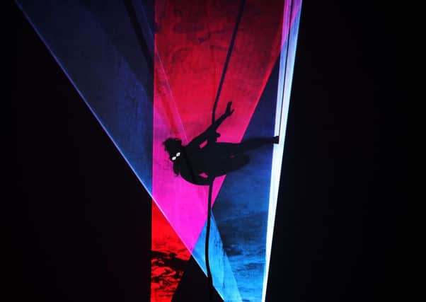 Aerial Artist AedÃn Walsh performs Liquid Sky at Tramway. PIC: John Devlin for The Scotsman