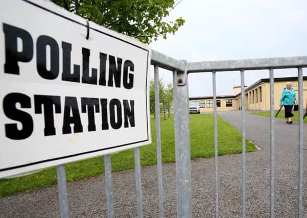 A voter leaves a polling to station after, where people can vote in the Irish abortion referendum. Picture: AFP/Getty
