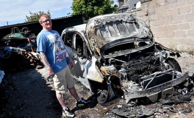 Martin Cheyne has had both his cars - a BMW and Corsa - set on fire outside his home in Sandhaven, Fraserburgh