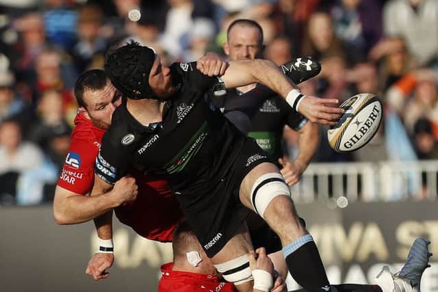 Glasgow's Tim Swinson is tackled by Rob Evans of Scarlets during the Guinness Pro14 semi-final. Picture: Ian MacNicol/Getty Images