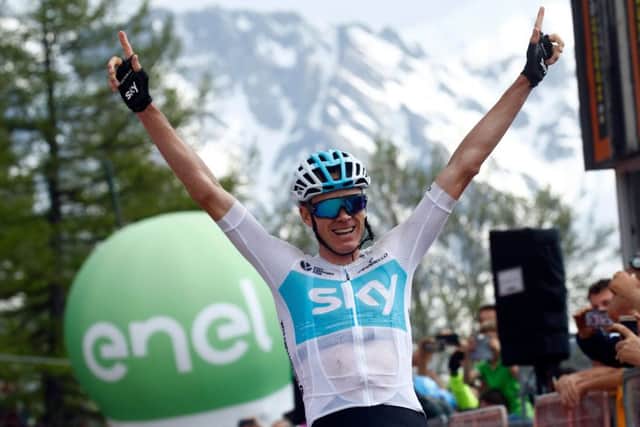 Chris Froome celebrates after powering to victory on stage 19. Picture: AFP/Getty