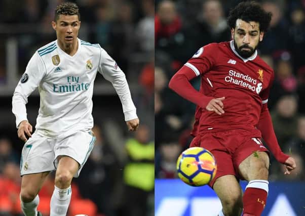 Cristiano Ronaldo and Mo Salah carry the goal threats for Real Madrid and Liverpool in tonight's final. Picture: AFP/Getty.