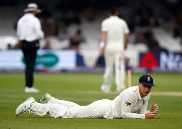 Jos Buttler of England looks on after failing to stop a Pakistan boundary. Picture: Getty.