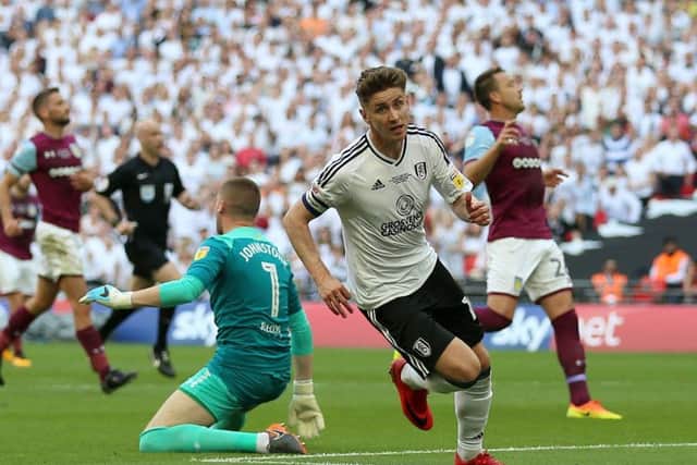 Fulhams Tom Cairney celebrates scoring the goal which defeated Aston Villa in the Sky Bet Championship final at Wembley. Photograph: Nigel French/PA.