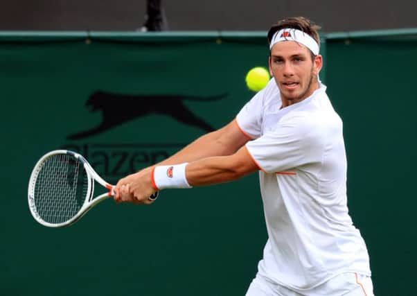 Cam Norrie had a breakthrough victory over American John Isner recently. Picture: PA.