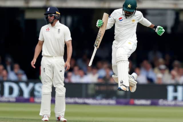 Pakistans Haris Sohail jumps in the air after hitting the winning runs as Alastair Cook looks on. Picture: Getty.