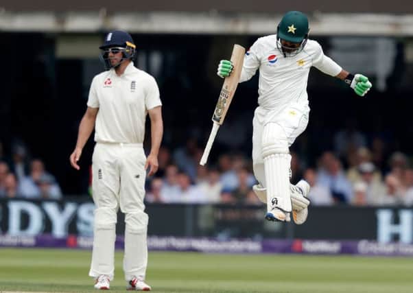 Pakistans Haris Sohail jumps in the air after hitting the winning runs as Alastair Cook looks on. Picture: Getty.