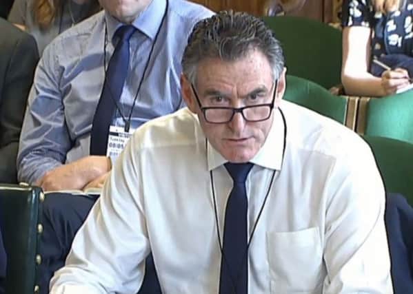 Ross McEwan, RBS chief executive giving evidence to the Scottish Affairs Committee on the banks plans to close more than 50 branches in Scotland.