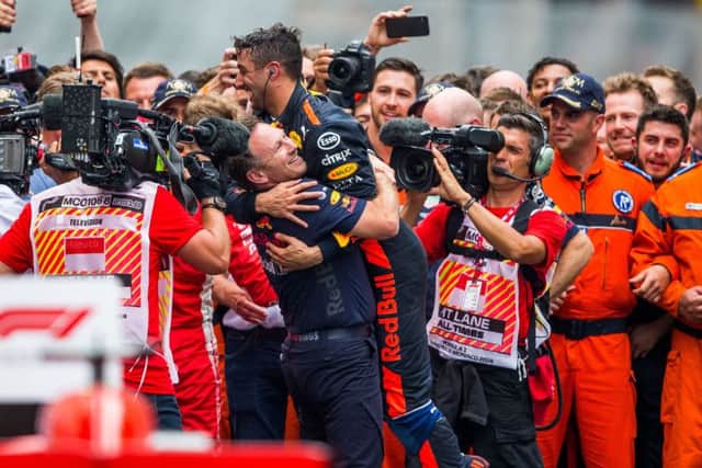 Daniel Ricciardo celebrates with Red Bulls team principal Christian Horner after his victory in Monaco. Picture: Getty