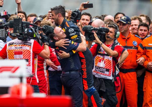 Daniel Ricciardo celebrates with Red Bulls team principal Christian Horner after his victory in Monaco. Picture: Getty