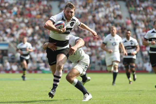Stand-off Finn Russell crosses for his try at Twickenham. Picture: PA.