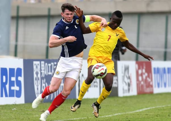 Oliver Burke challenges for the ball during the draw with Togo. Picture: Rex Shutterstock