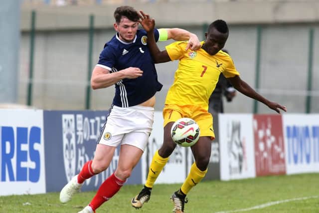 Oliver Burke challenges for the ball during the draw with Togo. Picture: Rex Shutterstock