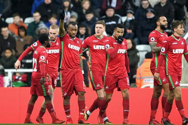 Celtic and Liverpool have both been linked with Jordan Ayew, seen here celebrating a goal for Swansea City. Picture: Getty Images