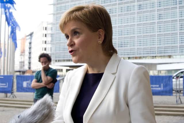 Scotland's Prime Minister Nicola Sturgeon speaks with the media outside EU headquarters in Brussels. (AP Photo/Virginia Mayo)
