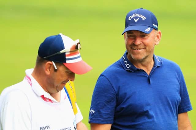 Thomas Bjorn with his caddie during the BMW PGA Championship at Wentworth. Picture: Andrew Redington/Getty Images